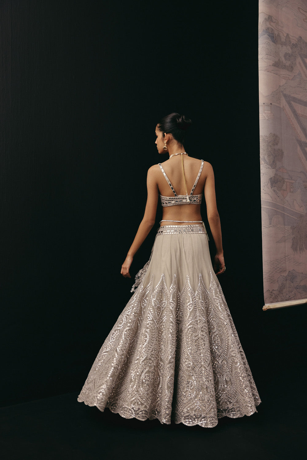 Silver Zari Mirrorwork Lehenga with Cape Sleeves Jacket and Bralette