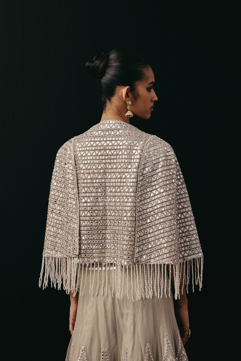 Silver Zari Mirrorwork Lehenga with Cape Sleeves Jacket and Bralette