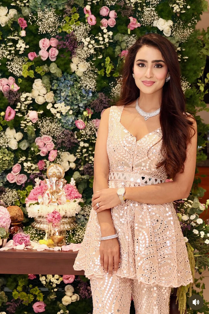 Muskaan Sethi  in our Mirrorwork Scallop Peplum Jacket and Scallop Bell Bottom