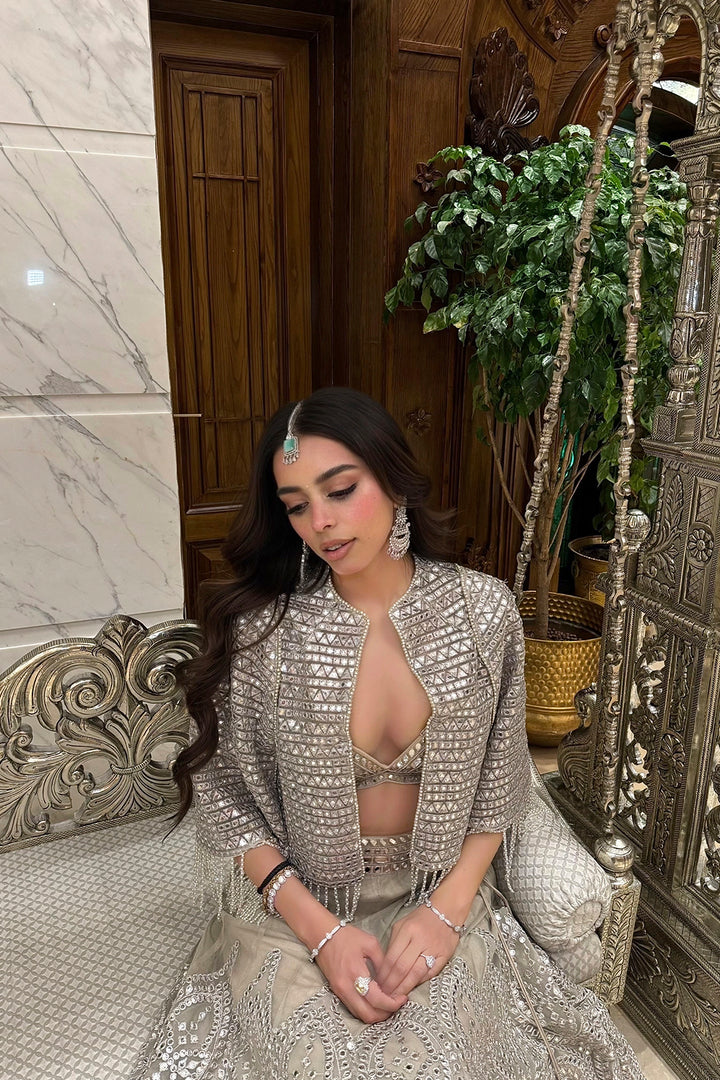 Komal Tanwar in our Silver Zari Mirrorwork Lehenga with Cape Sleeves Jacket and Bralette