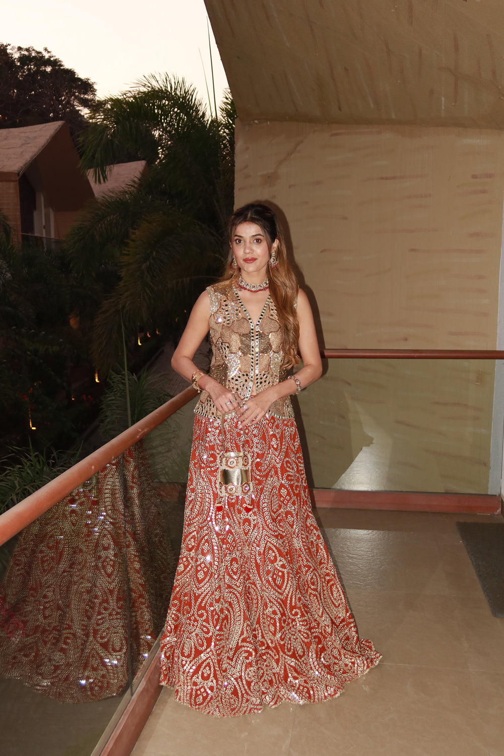 Aahana Shah in our Mirrorwork Fish Cut Lehenga with Gilet and Dupatta