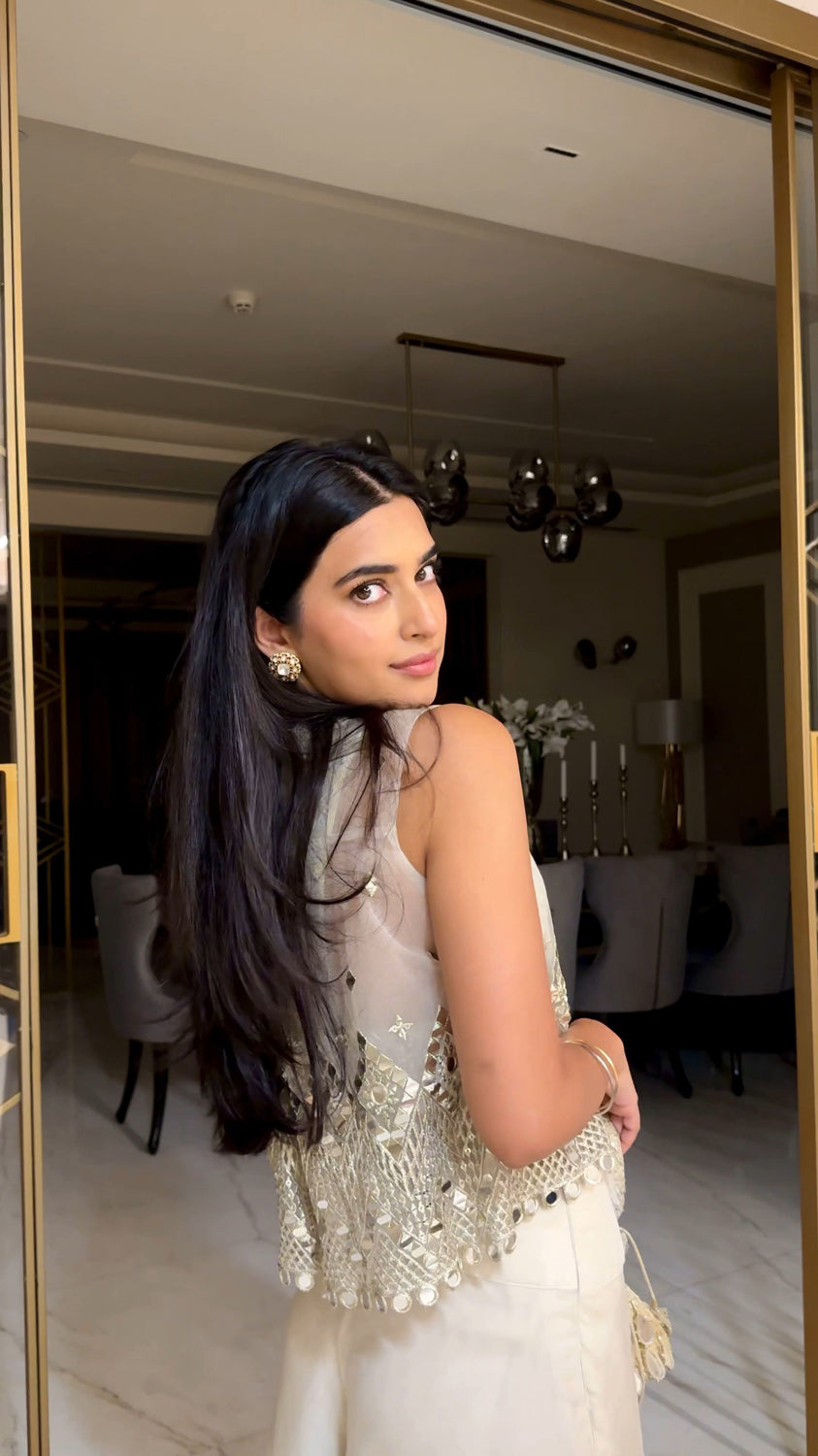 Bhavdeep Kaur in our Asymetrical Jacket with Bralette and Organza Asymetrical Flared Pants