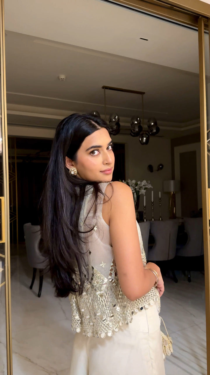 Bhavdeep Kaur in our Asymetrical Jacket with Bralette and Organza Asymetrical Flared Pants