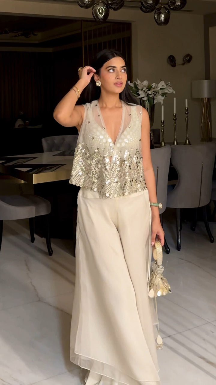 Bhavdeep Kaur in our Asymetrical Jacket with Bralette and Organza Asymetrical Flared Pants