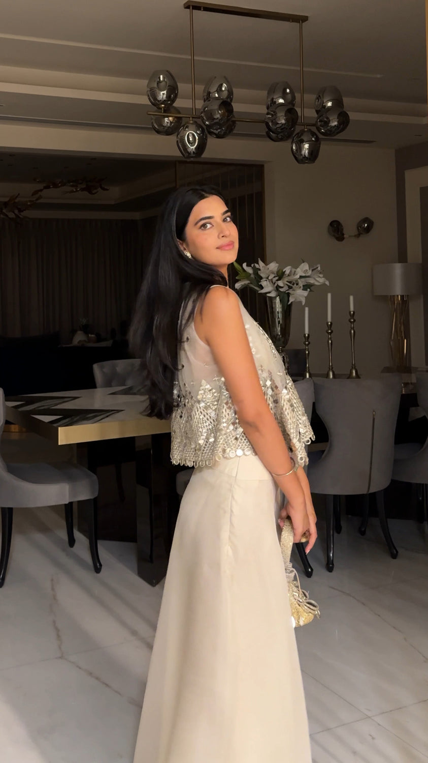 Bhavdeep Kaur in our Asymetrical Jacket with Bralette and Organza Asymetrical Flared Pants