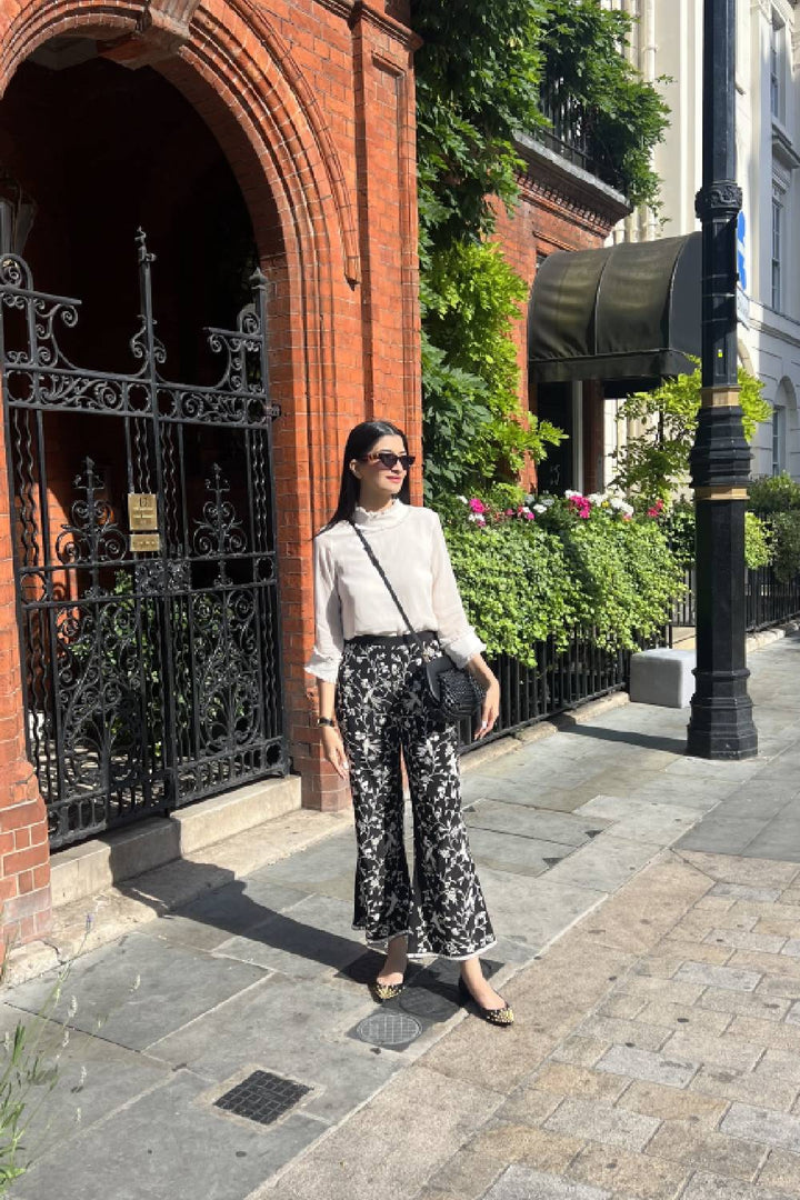 Hanna Khan in our White Ruffle Top