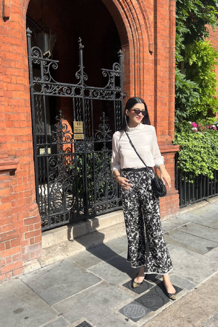 Hanna Khan in our White Ruffle Top