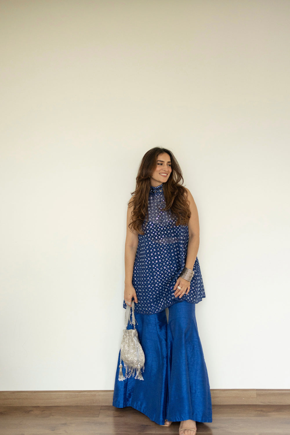 Urmi Daga in our Short hi neck A Line top and Dupian Bellbottoms