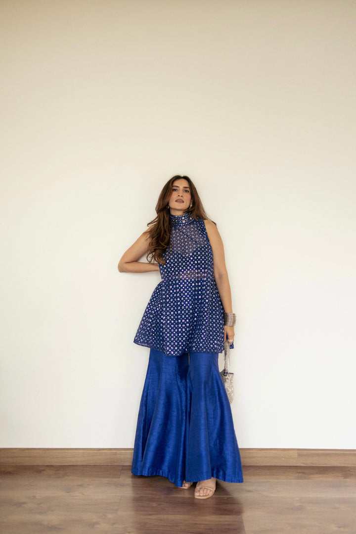 Urmi Daga in our Short hi neck A Line top and Dupian Bellbottoms
