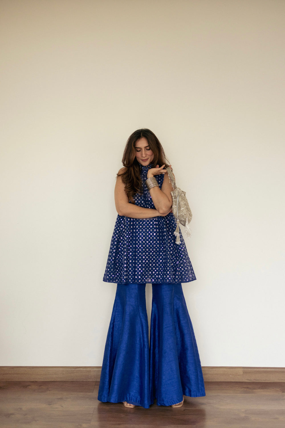 Urmi Daga in our Short hi neck A Line top and Dupian Bellbottoms