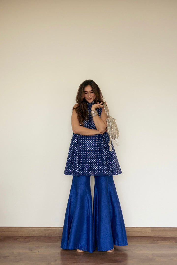 Urmi Daga in our Short hi neck A Line top and Dupian Bellbottoms