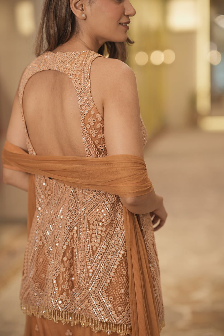 Somya Bakshi In Our Backless Peplum Top with Bootcut and Dupatta