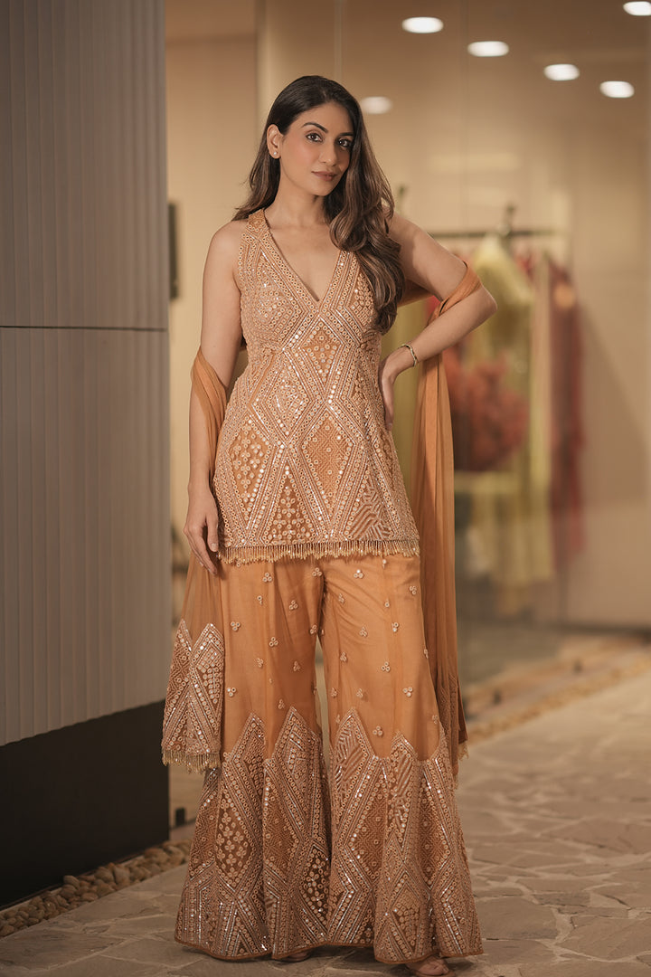 Somya Bakshi In Our Backless Peplum Top with Bootcut and Dupatta